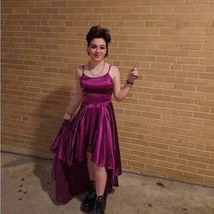 Spaghetti strap dress with long train. Criss cross back.